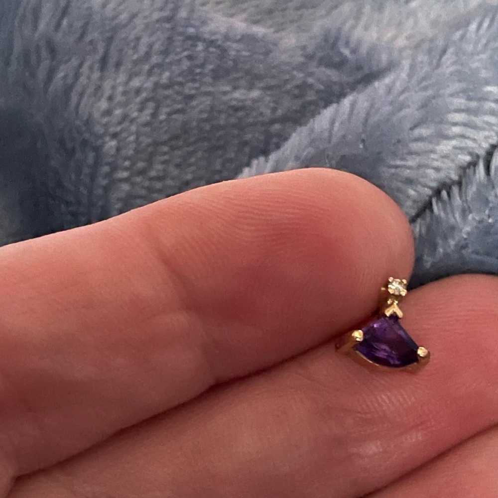 Single 14k yellow gold genuine amethyst earring.